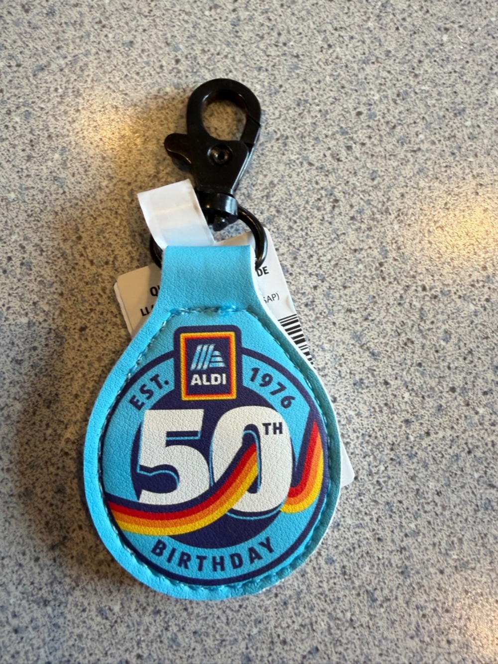 ALDI 50th Birthday Key Fob - Blue with Rainbow Accent Quarter Keeper Holder